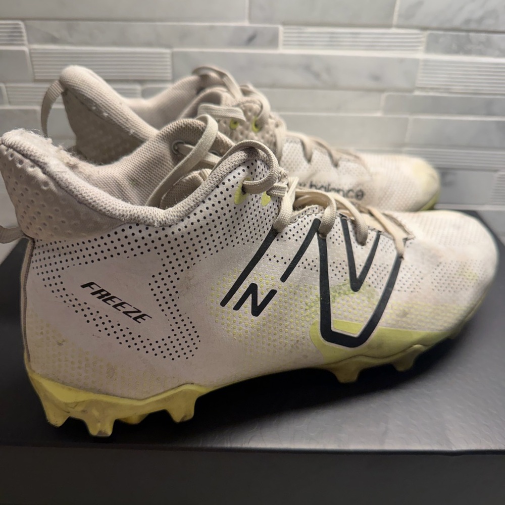 New Balance Freeze Cleats in White and Yellow